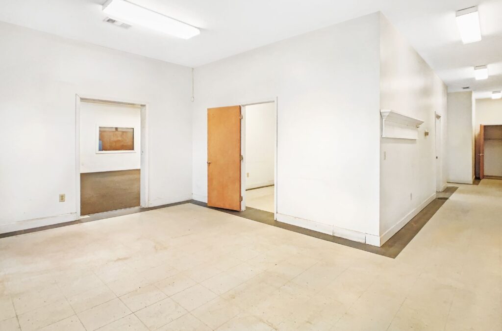 An employee highlighting the modern amenities of office spaces for rent in Homewood, AL by Right Space.