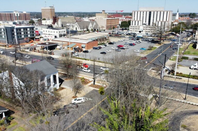 A Right Space employee showing a professional office space for rent in Chelsea, AL. Ideal for various business needs.