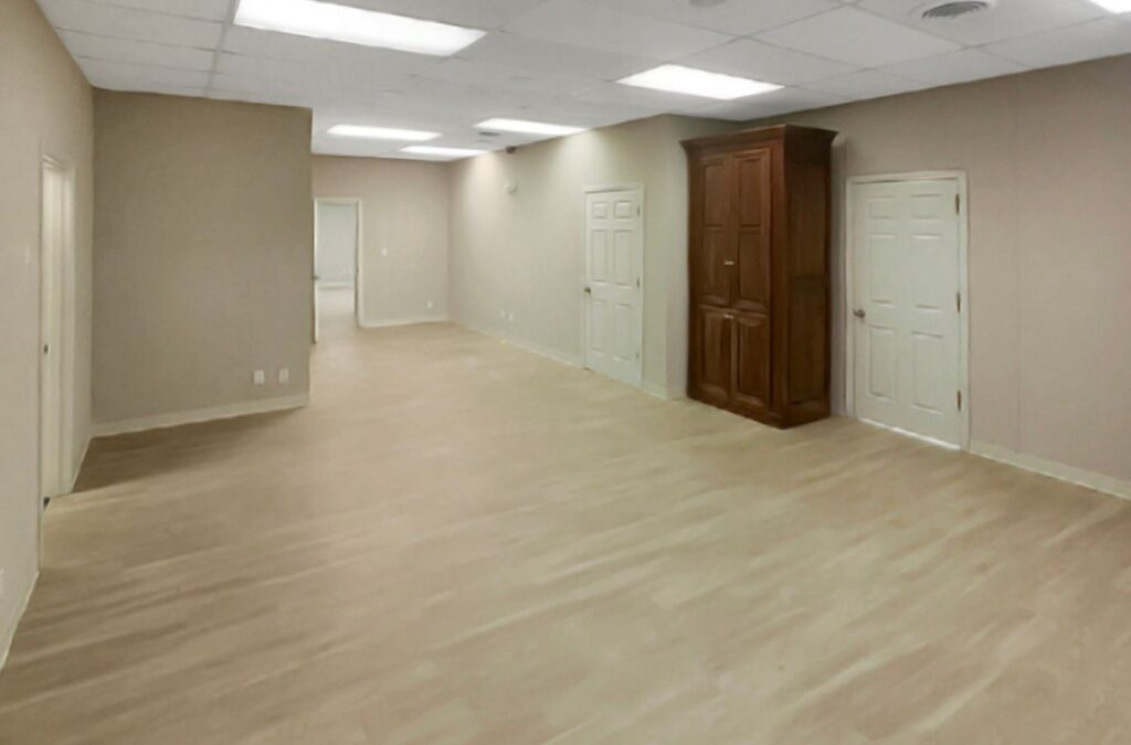 Benefits of private office space for rent in Vestavia Hills, AL by Right Space employee setting up an office.